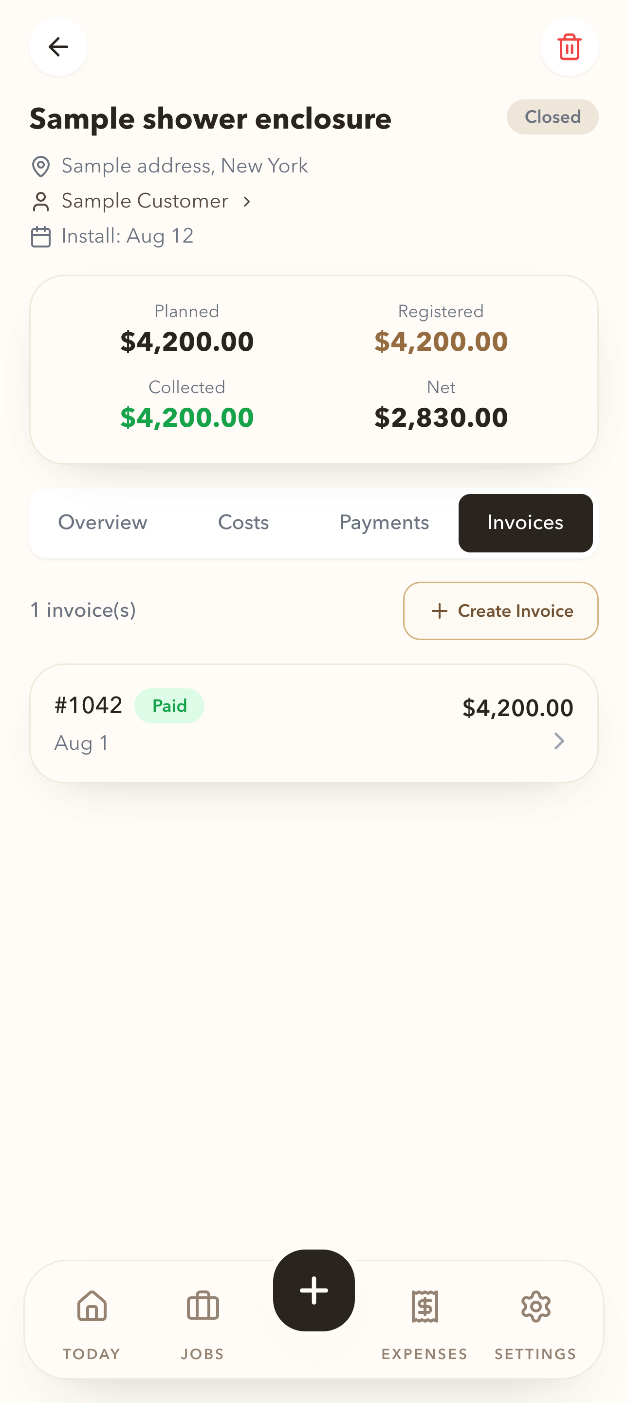 MetroGlass OS invoice view with a fictional paid invoice